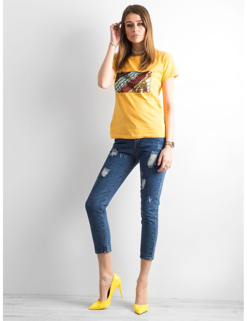 Spodnie ankle jeans z przetarciami