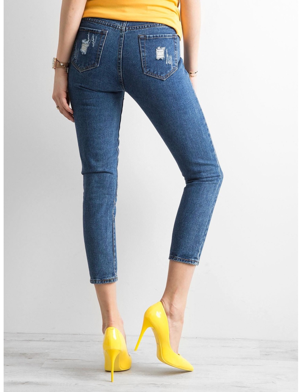 Spodnie ankle jeans z przetarciami
