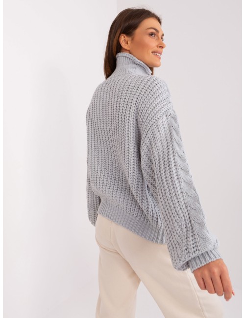 Sweter oversize z warkoczami