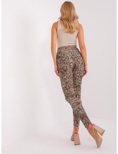 Beżowo-czarne legginsy na co dzień z nadrukiem zwierzęcym