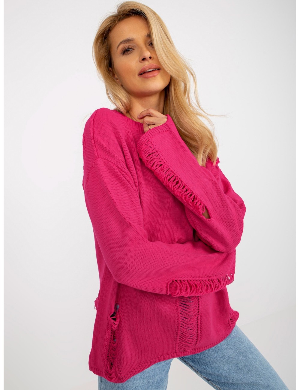 Damski sweter oversize z dziurami z wełną