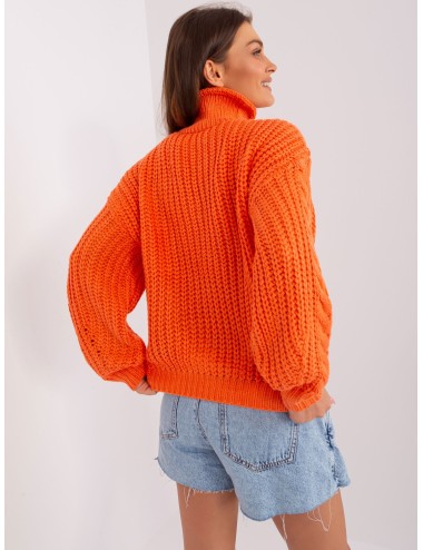Damski sweter oversize z warkoczami