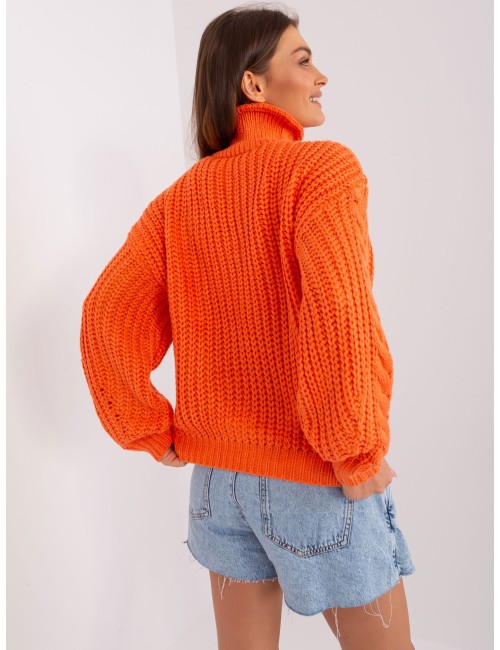 Damski sweter oversize z warkoczami