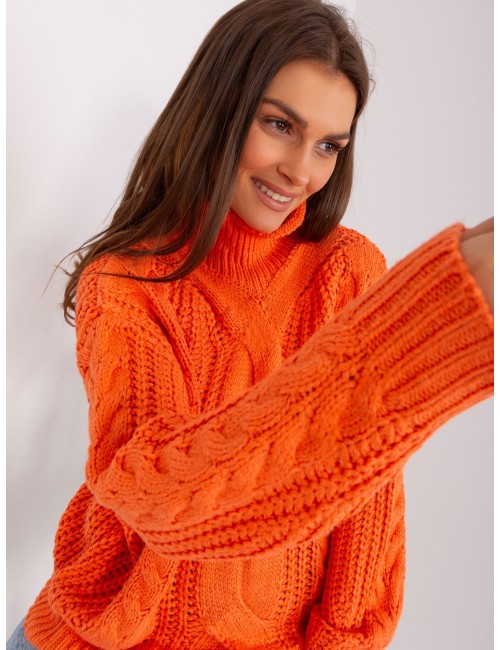 Damski sweter oversize z warkoczami