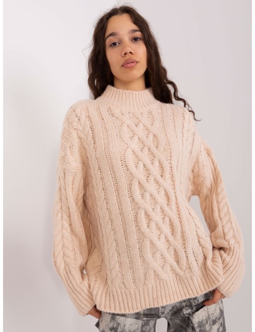 Sweter w warkoczowe sploty