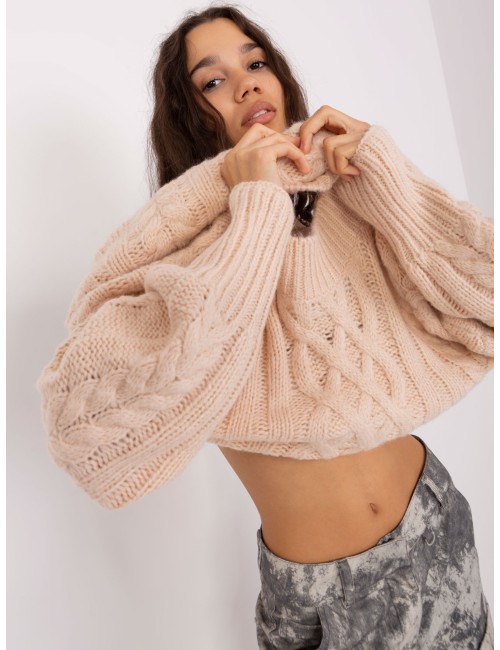 Sweter w warkoczowe sploty