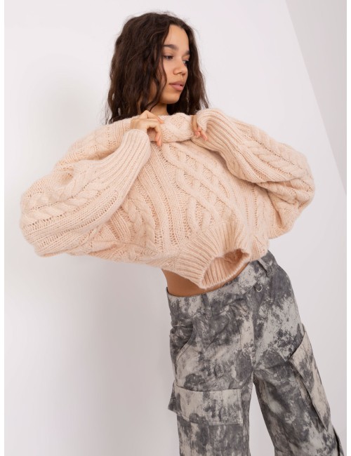 Sweter w warkoczowe sploty