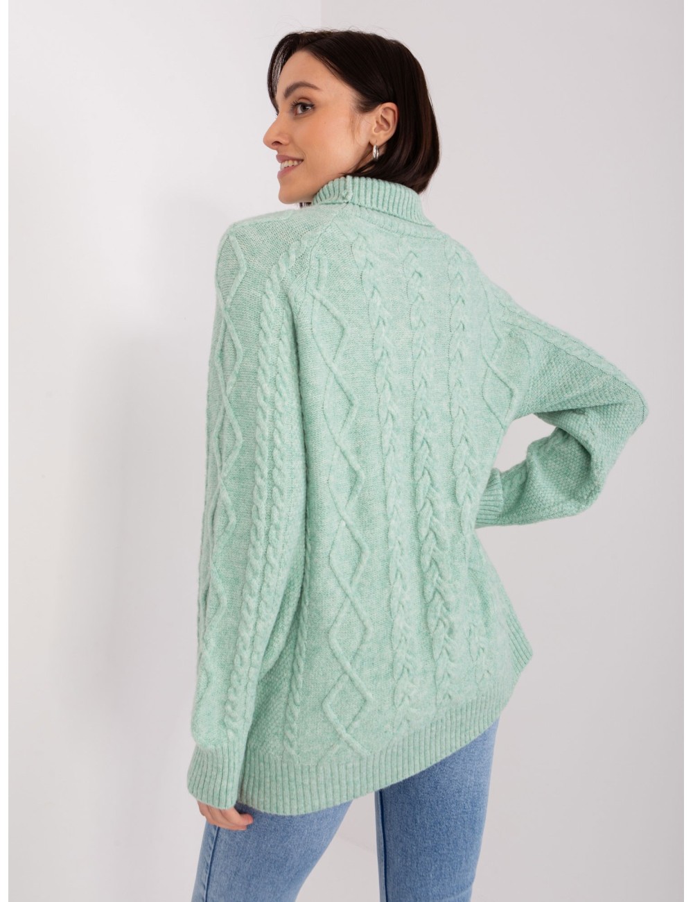 Miętowy damski sweter w warkocze