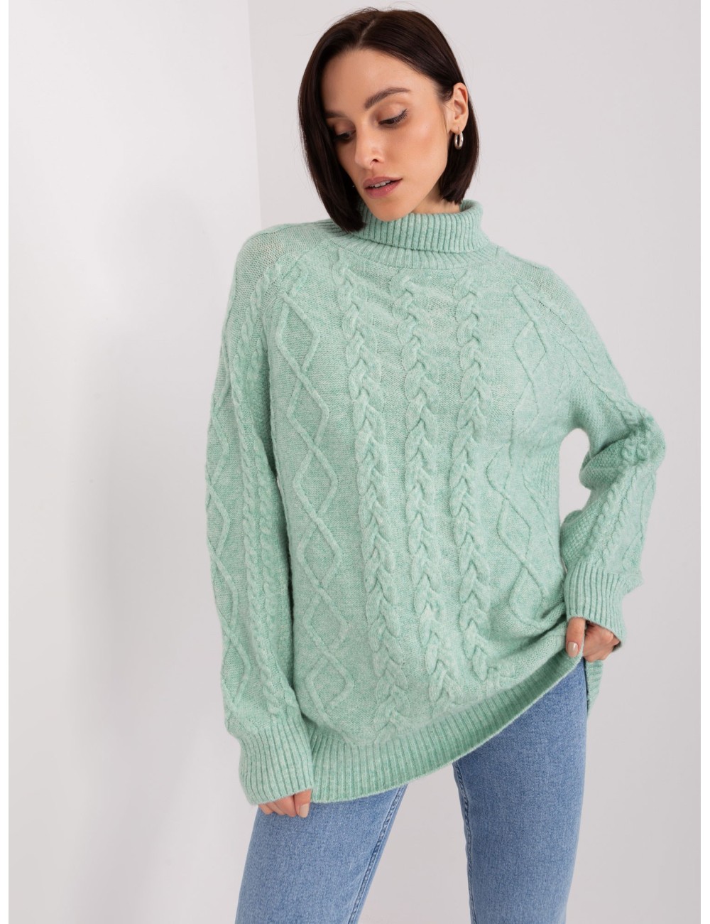 Miętowy damski sweter w warkocze
