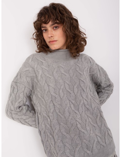 Damski dzianinowy sweter w warkocze
