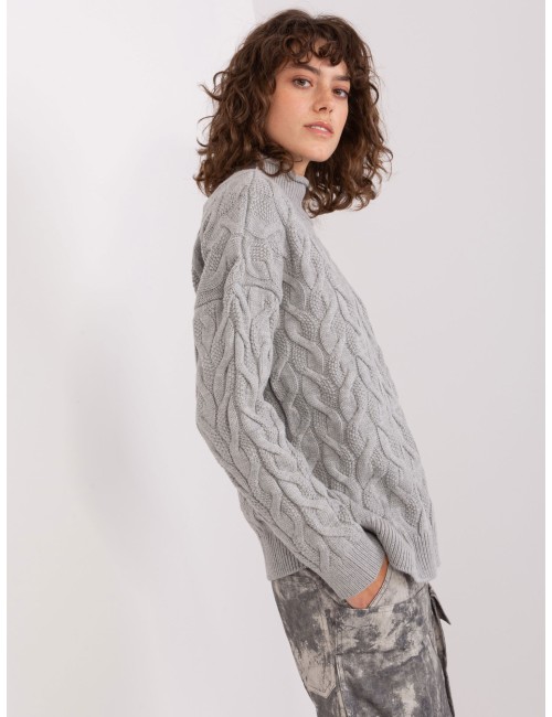 Damski dzianinowy sweter w warkocze