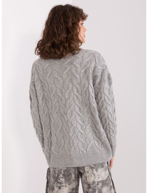 Damski dzianinowy sweter w warkocze